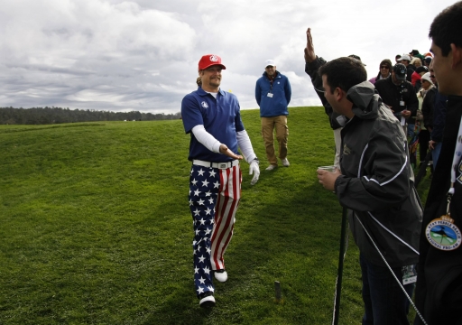 Kid Rock greets members of the gallery during the third round of the ..